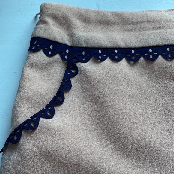 Blush shorts with navy lace type detailing - Picture 2 of 3